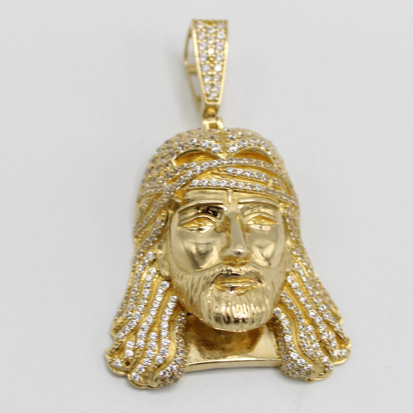 Gold jesus face on sale pendant