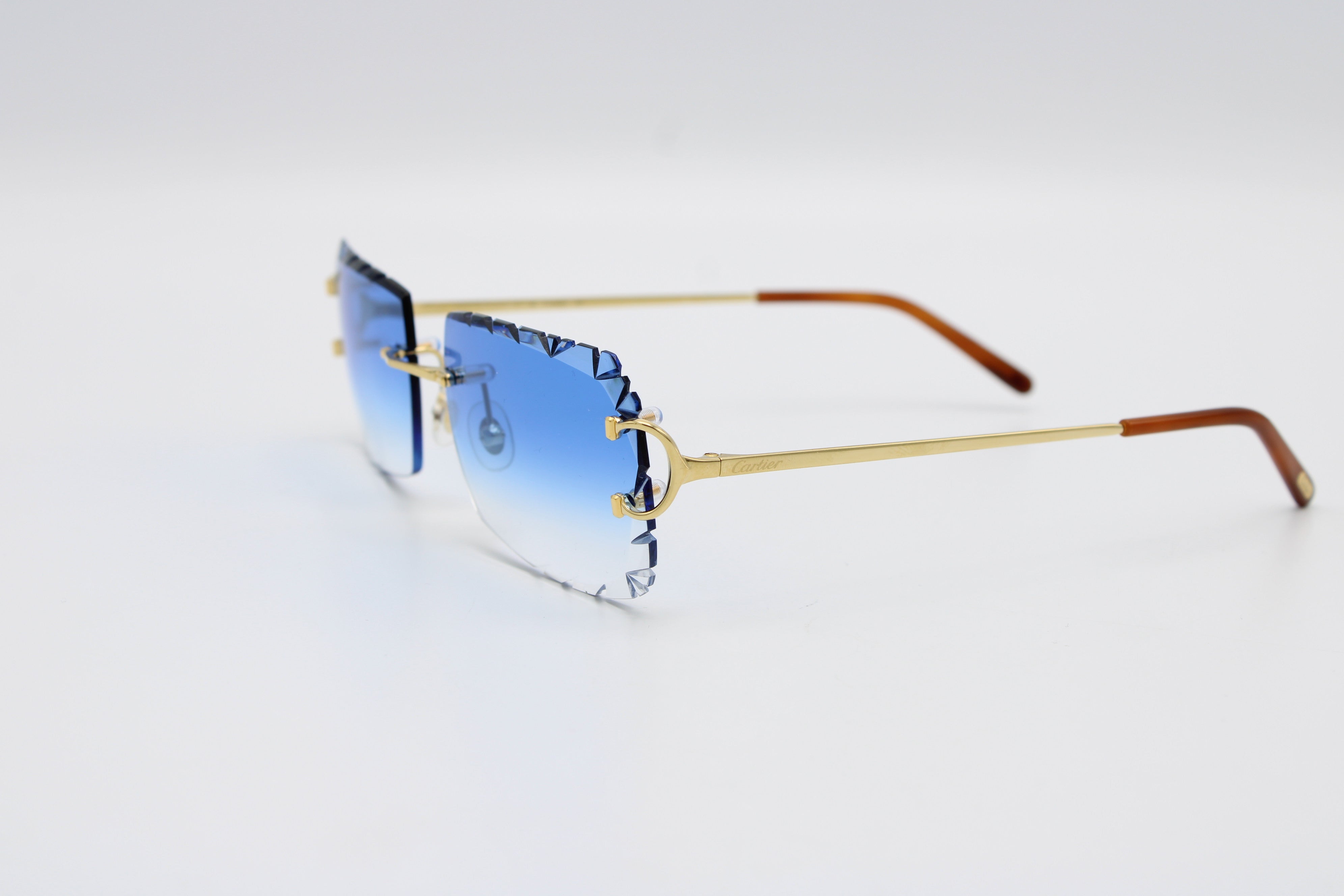 Cartier sunglasses blue online lens