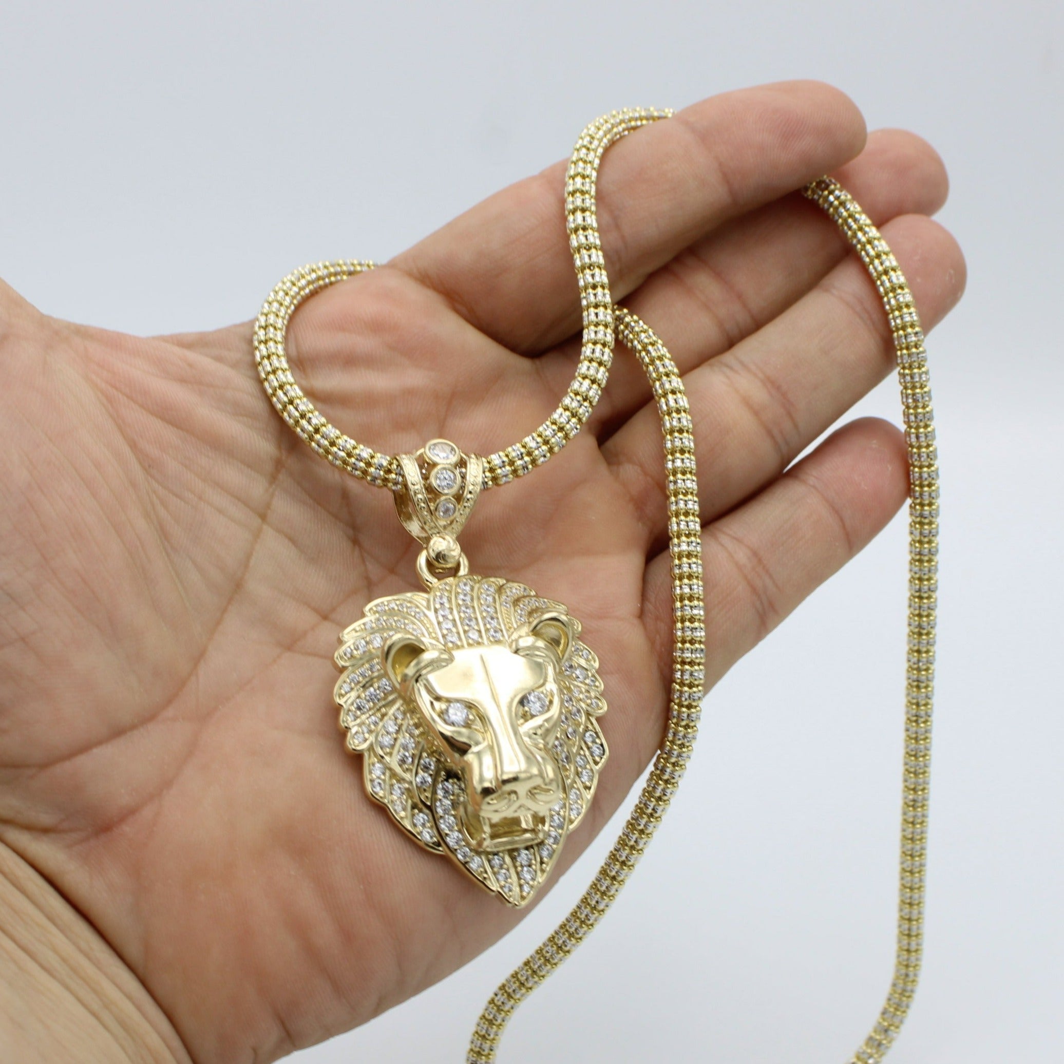 Gold chain lion on sale pendant